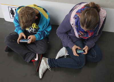 photo of kids playing video games